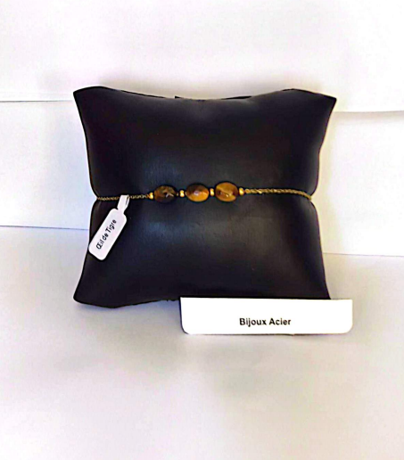 Bracelet Œil de Tigre acier inoxydable doré sur coussin noir